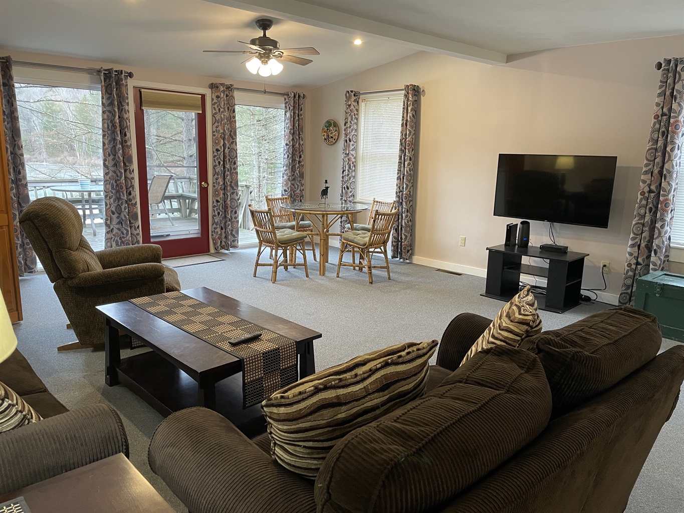 Open living and dining area overlooking the lake