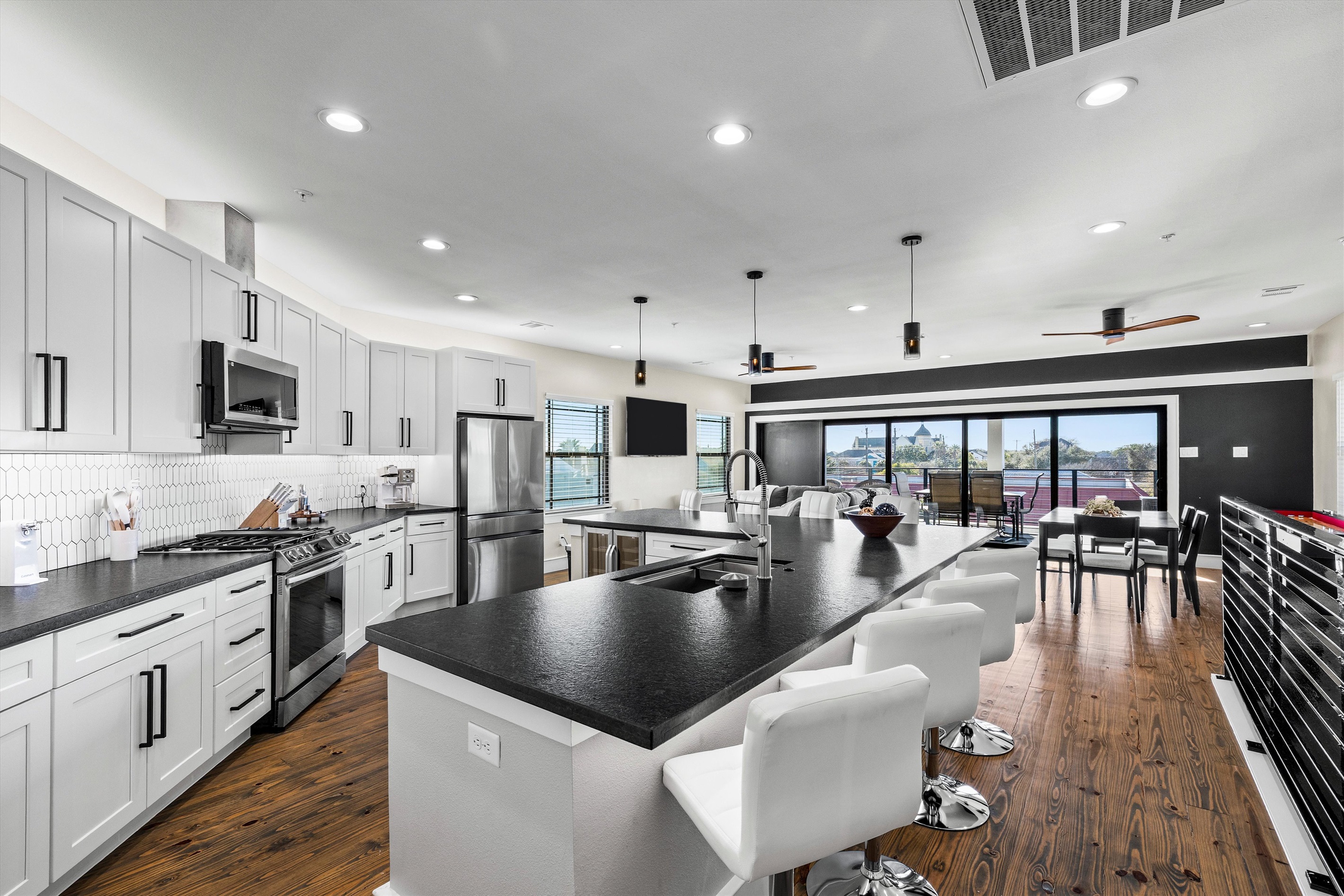 Gourmet Kitchen: Whip up culinary delights in this stylish, sunlit chef's paradise!