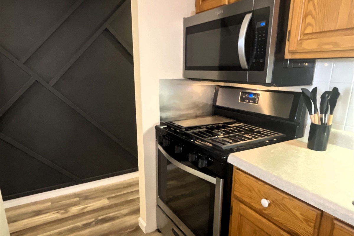 Fully Stocked kitchen with full size stove