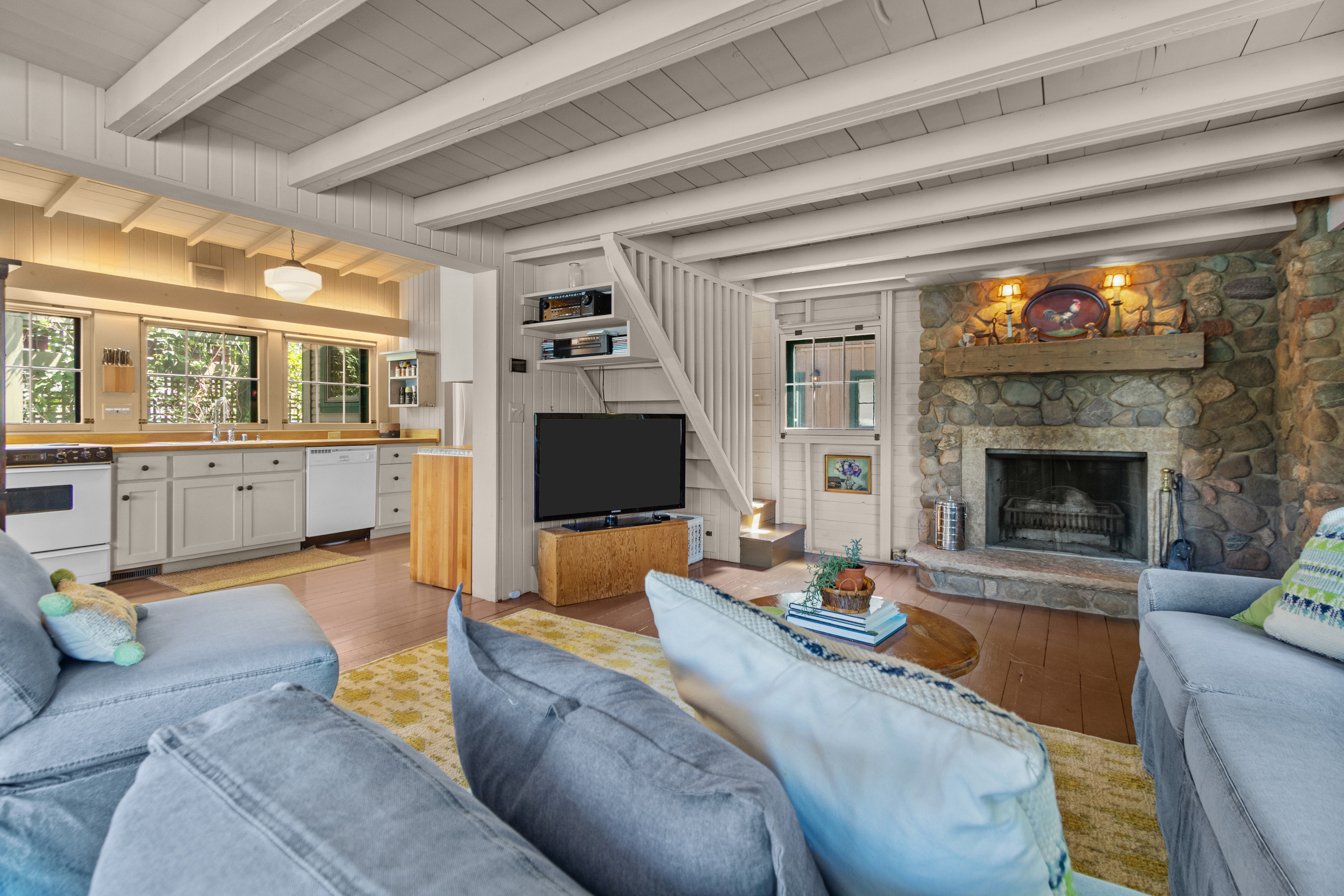 Sink into the cozy sofa, put your feet up, and unwind after a day on the lake—the perfect spot to relax and enjoy a slower pace.