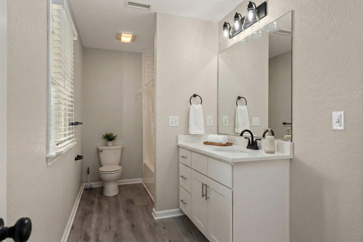 BL Bathroom - Elegant bathroom with a dual vanity and sophisticated lighting for a spa-like experience.