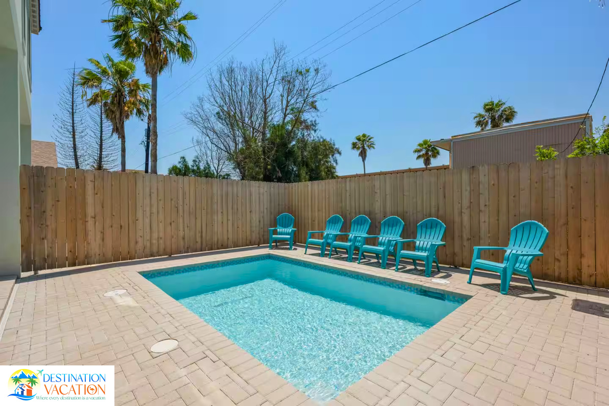 Sunny pool days await at your private coastal retreat.