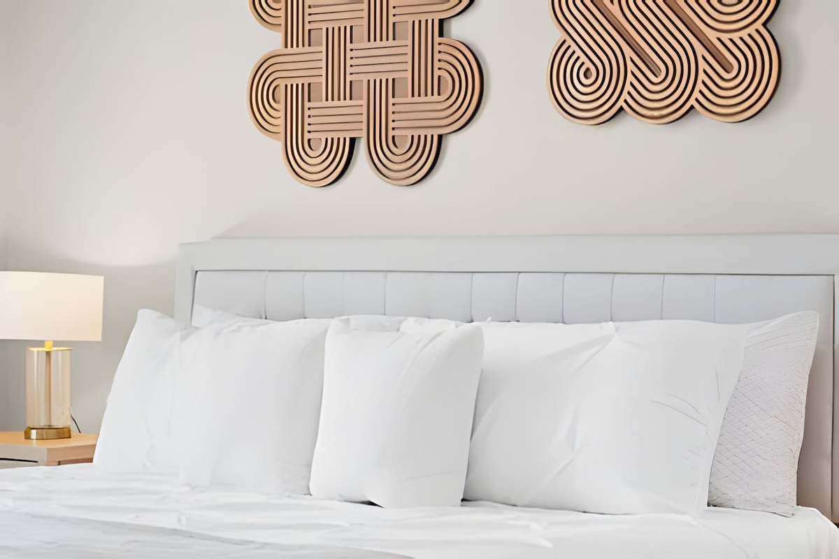Snuggle into comfort in this cozy bed with minimalist style.