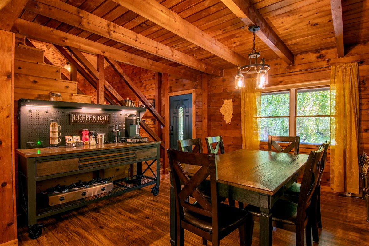 Coffee bar can double as a buffet counter. Under the counter is a 3 hole crockpot and cast iron skillet.