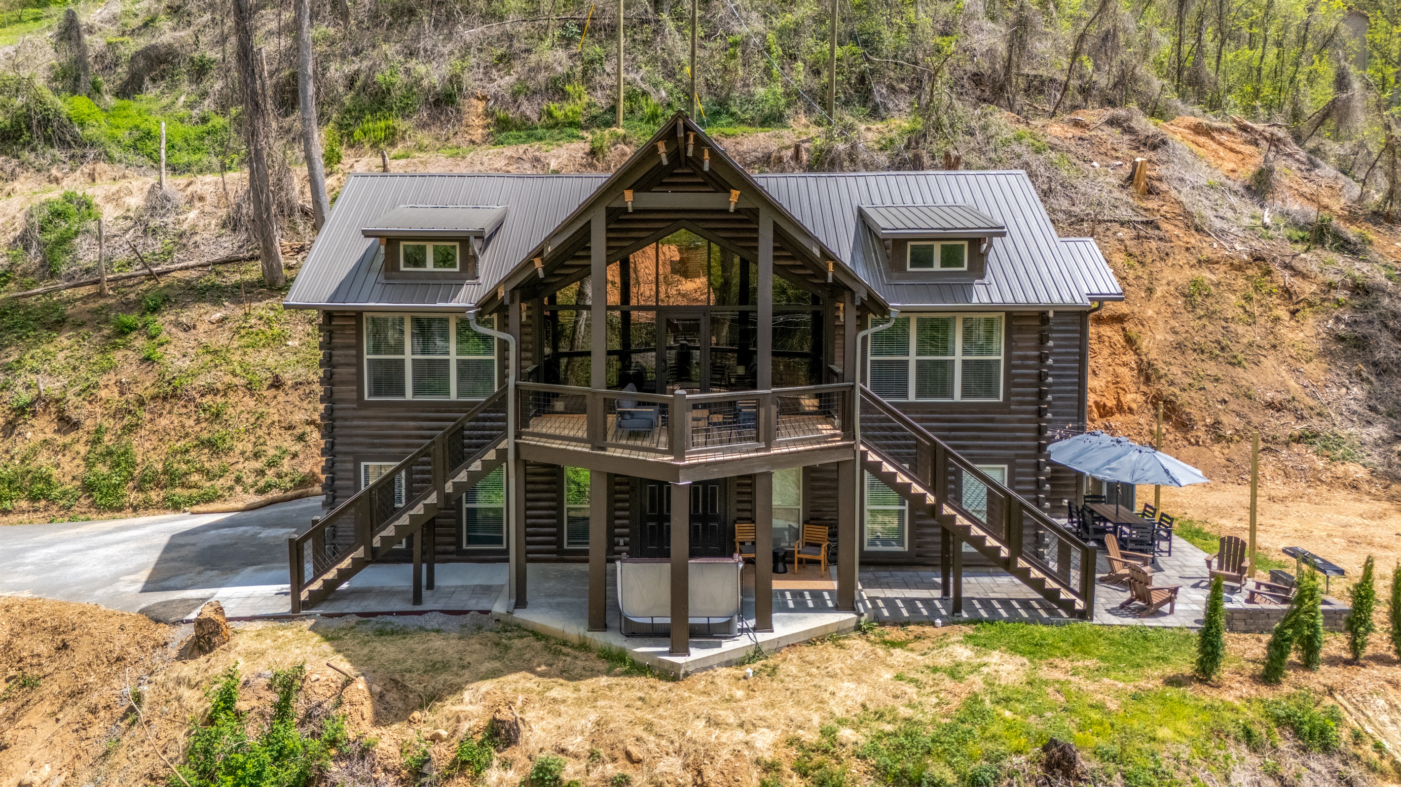 Two stories on a large, secluded property. Deck, hot tub, outdoor eating area.