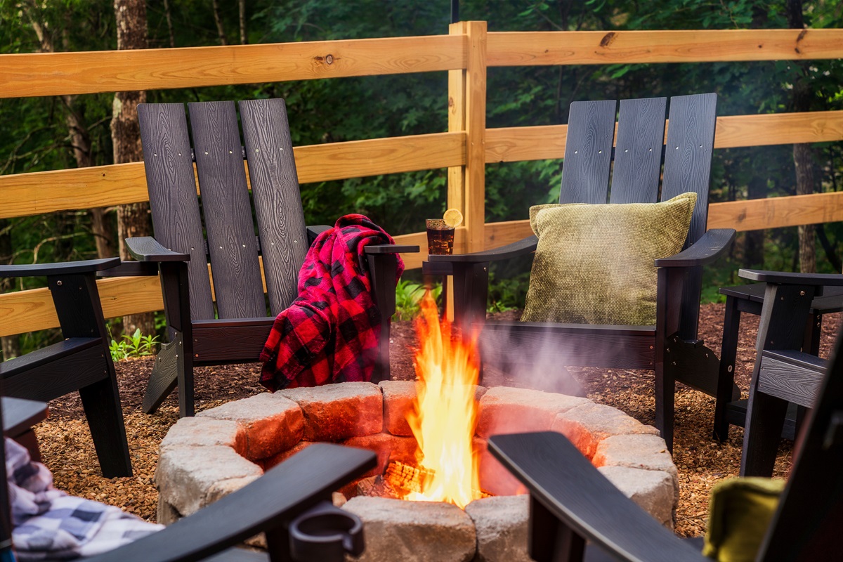 Backyard with fire pit and string lights