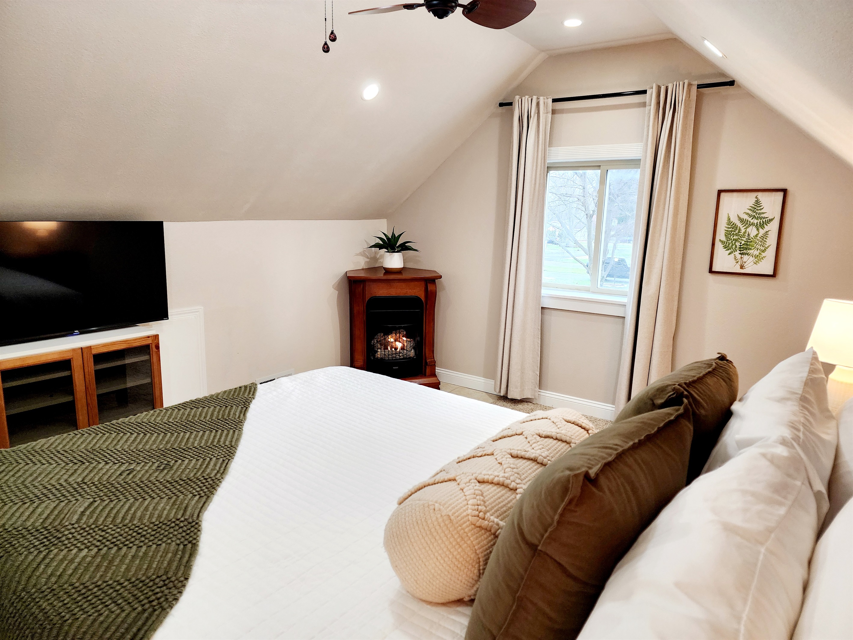 Cuddle up in bed to watch a movie while in your private master bedroom. 