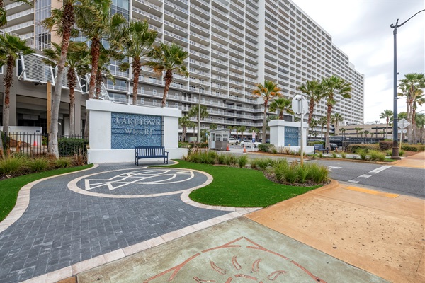 Front entrance where you talk to security and show your reservation.  We have a secure property with regular patrols 24 hours a day.