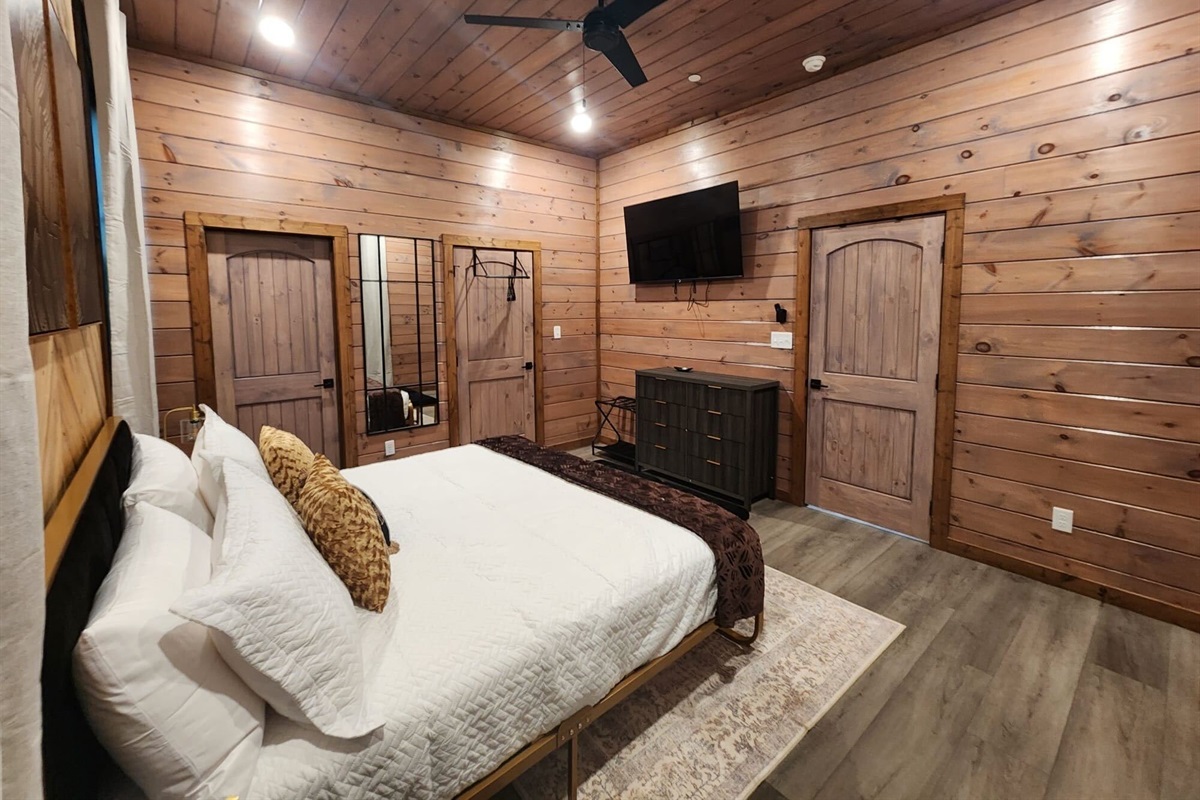 Rustic elegance with a king bed and inviting decor.