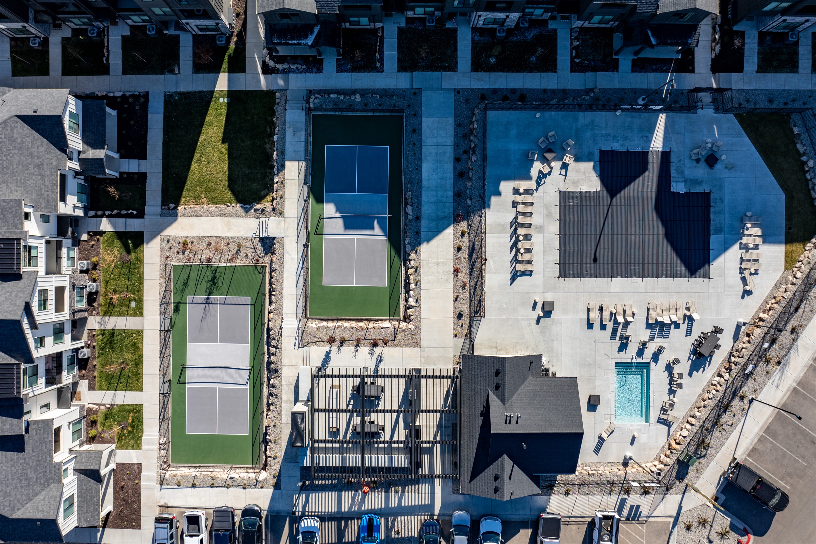 Bird's eye view of Pickleball courts, pool, and hot tub.