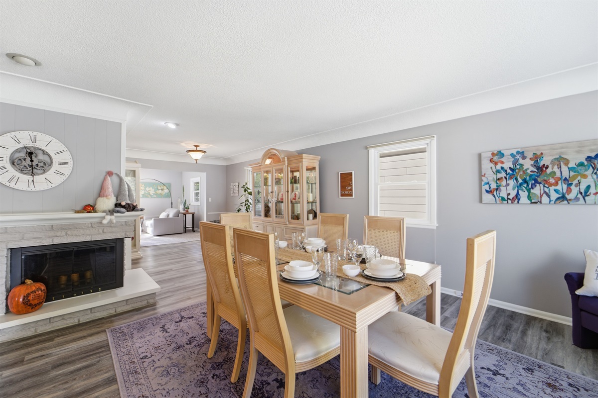 Open naturally light dining space greats you as you enter the Cozy Heights Retreat.