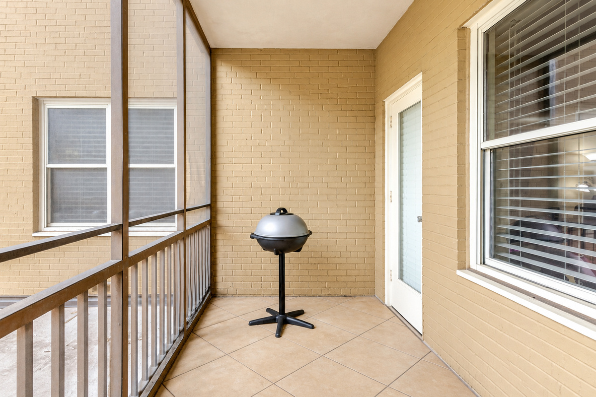 For a property listing or house manual:

**Barbecue Grill on the Balcony** — Enjoy outdoor cooking and dining from the comfort of your private balcony.