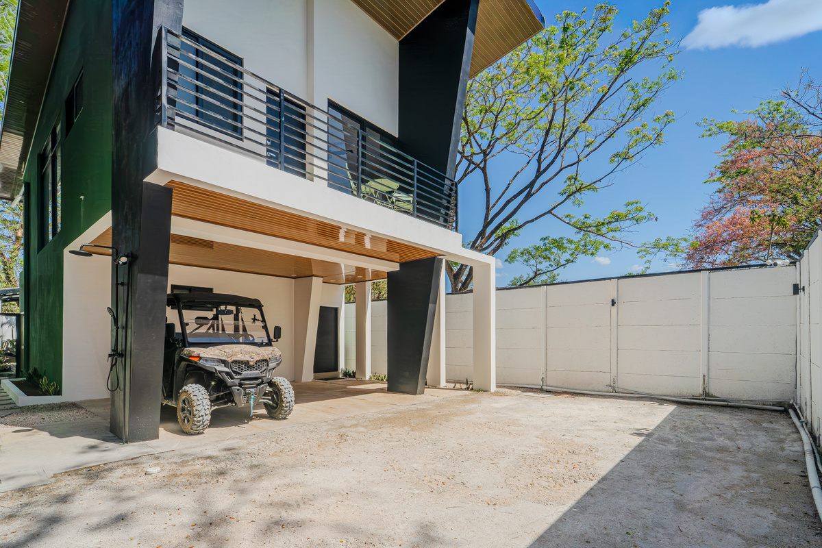 Casa Brisa from the street. Covered carport, private parking.