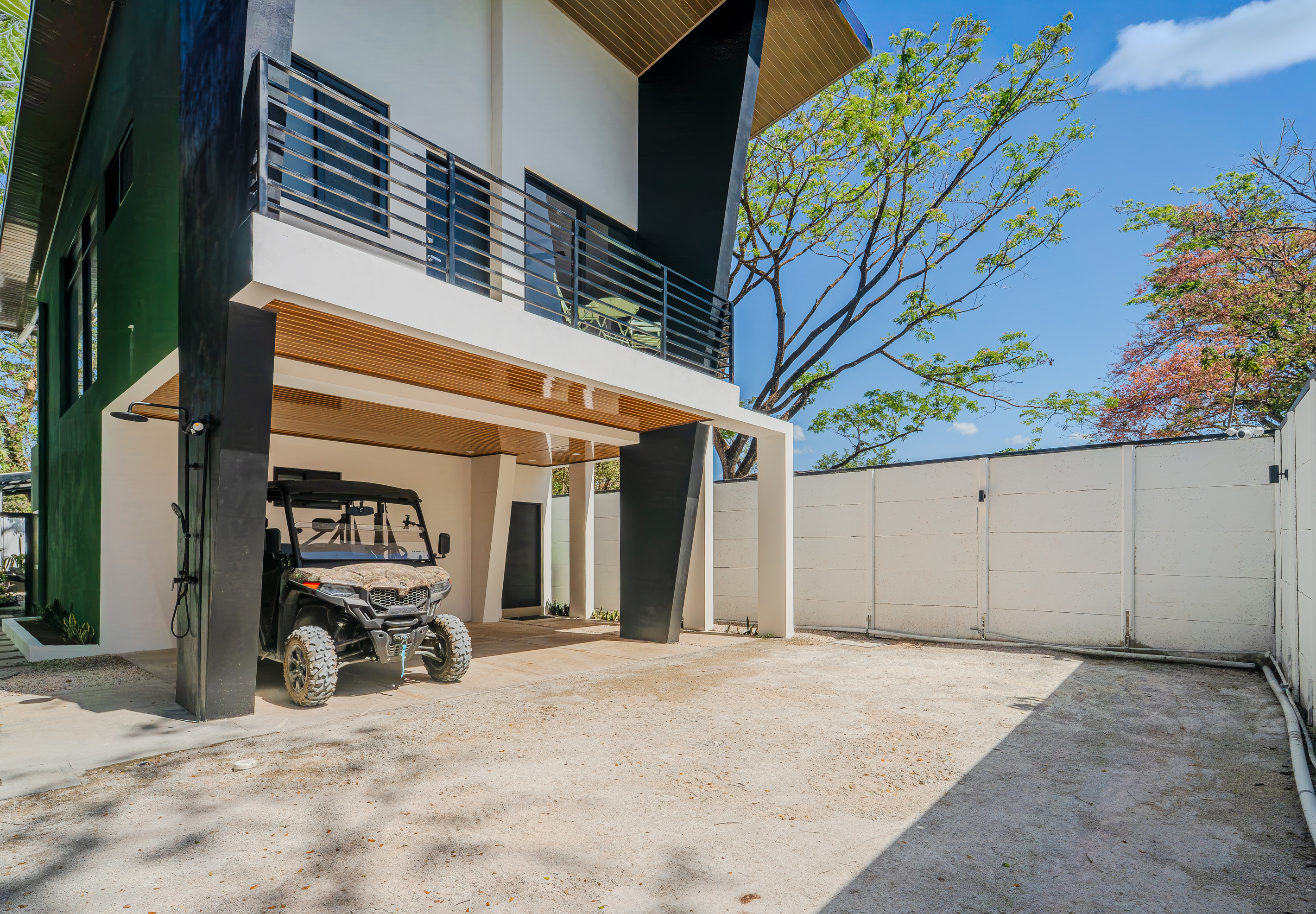 Casa Brisa from the street. Covered carport, private parking.