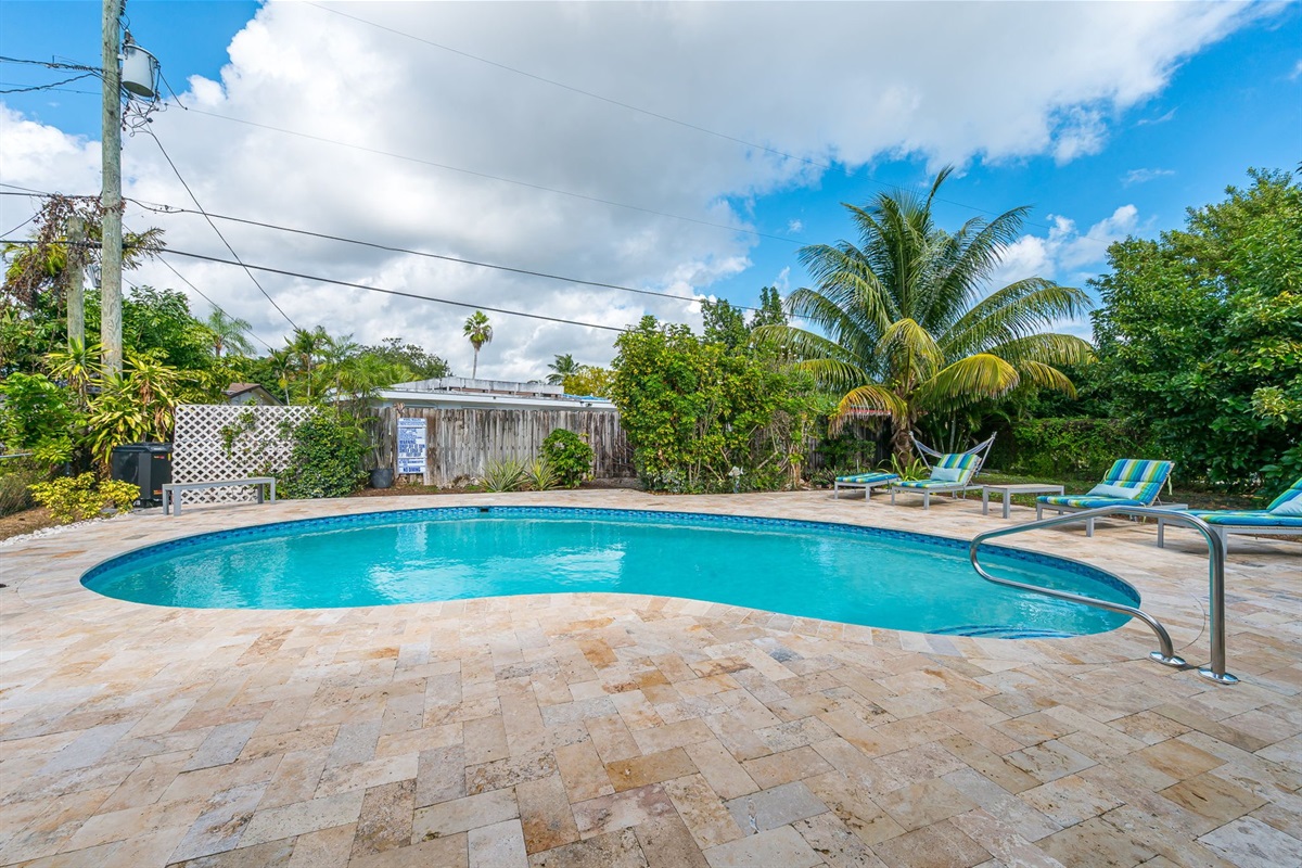 The outside is a highlight, with the heated pool, outdoor sun- loungers, BBQ and covered dining area.