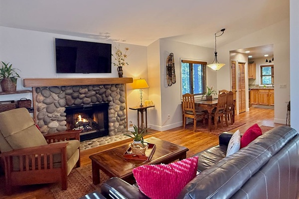 Relax and enjoy the glow of the fireplace, a 4K HDR viewing experience, and the comfort of a leather sofa with a premium memory foam sleeper.