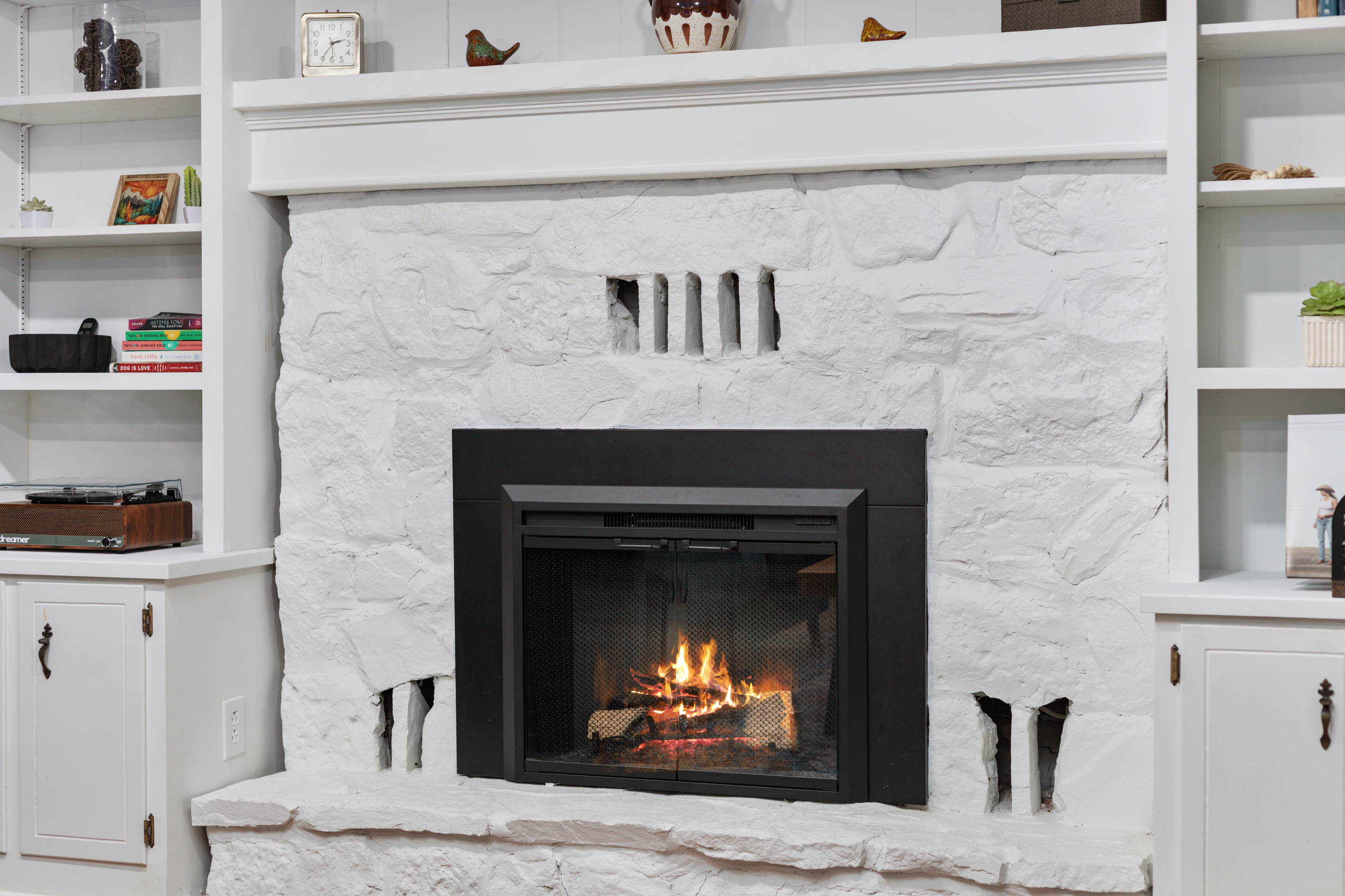 Gather around the electric fireplace for a quiet night in, complete with good company and a warm glow.