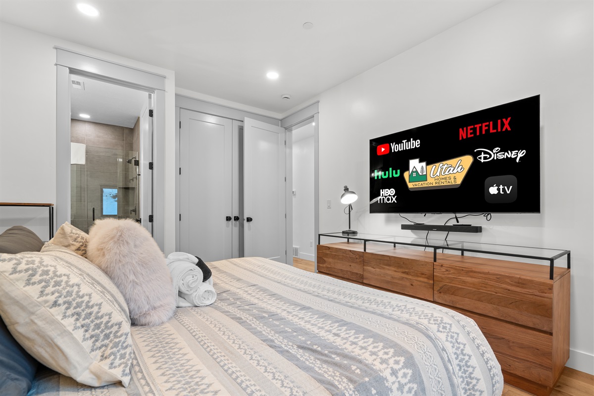 Bright, serene primary bedroom designed for rest and recharge.