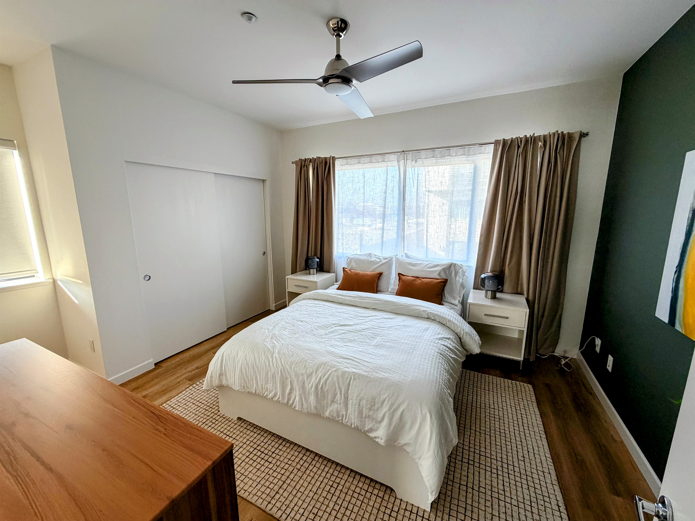 Primary bedroom with queen bed.