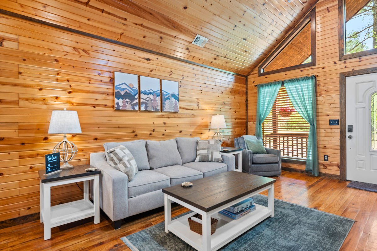 Sink into the comfy couches and let the rustic charm of the living room make you feel instantly at ease.