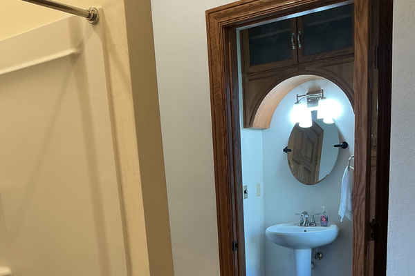 Main level full bathroom attached to office