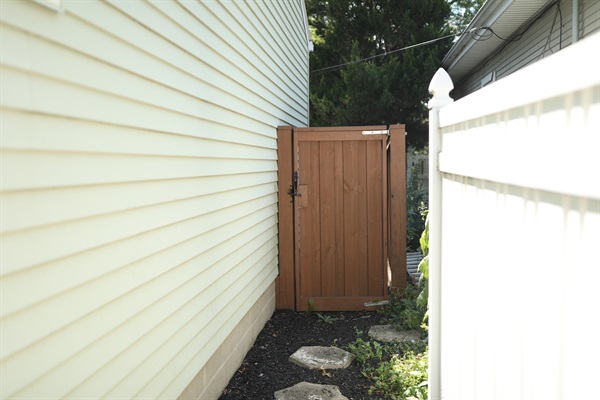 West side gate to backyard