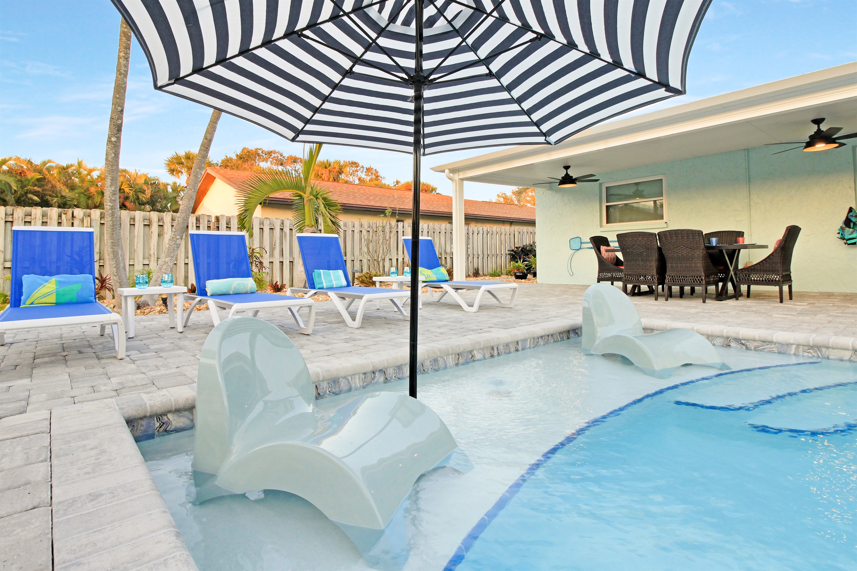 Enjoy the sun shelf with loungers and umbrella