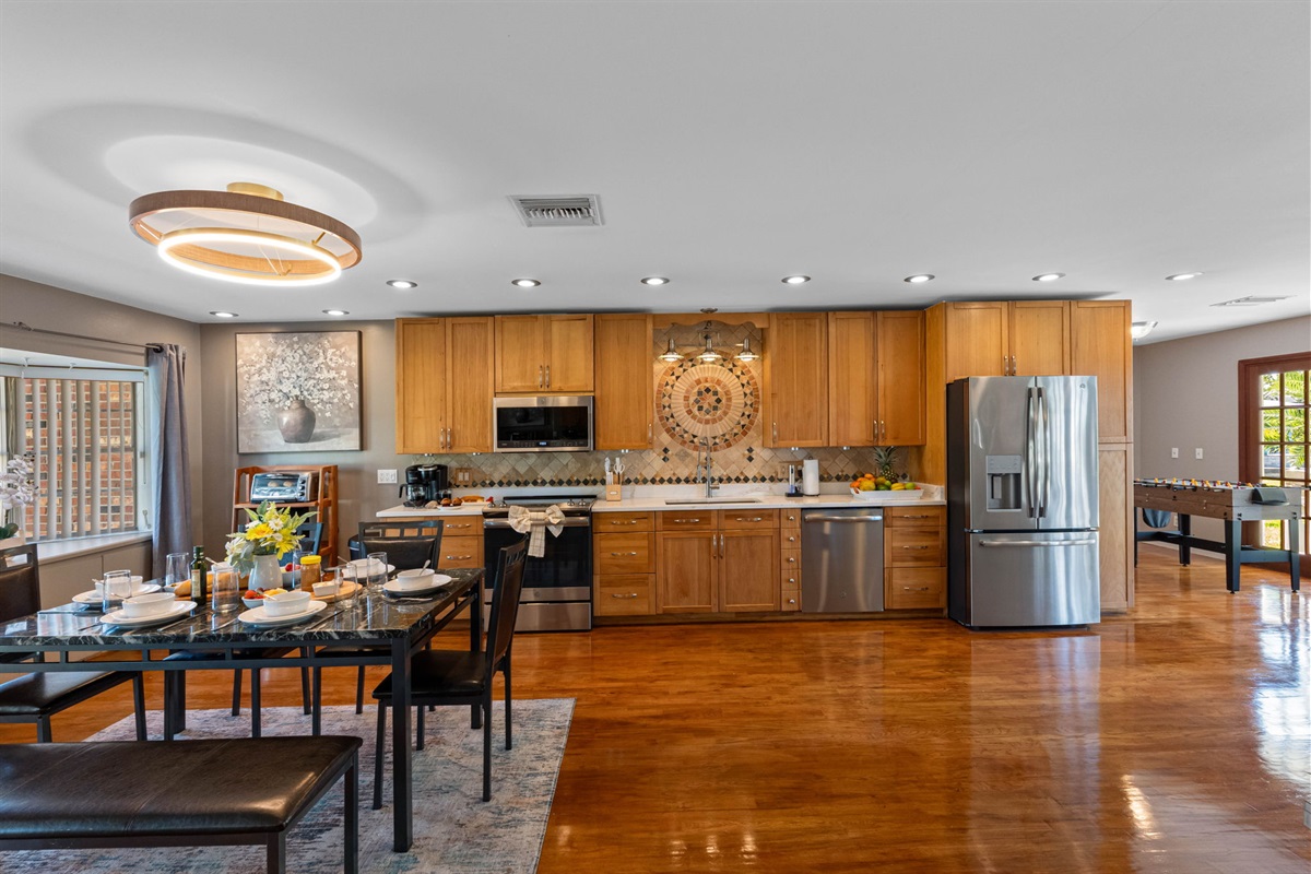 An open layout with plenty of counter space and a full dining area nearby makes this kitchen ideal for gatherings and family meals.