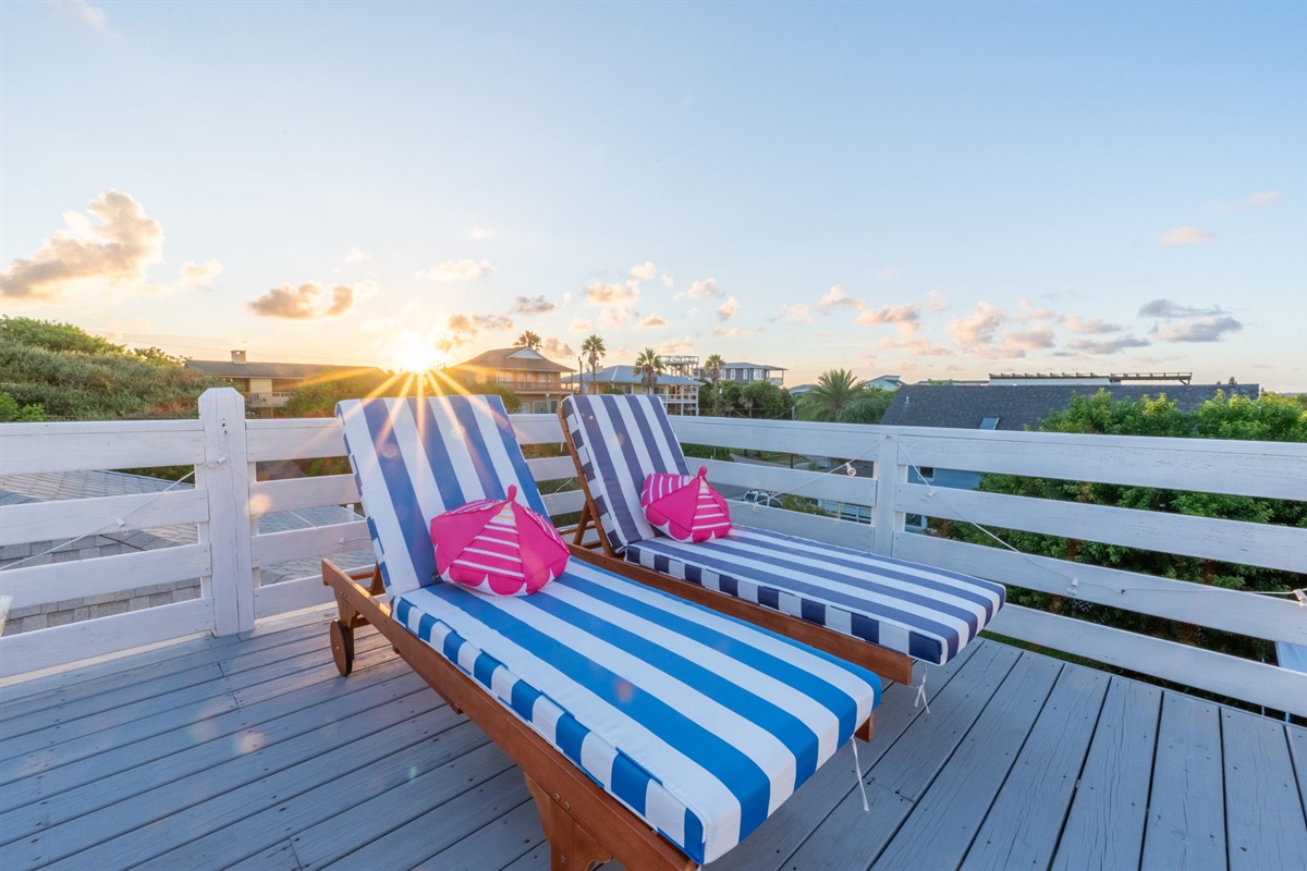 Beachy vibes and comfort in the Eagle’s Nest! These navy and white striped lounge chairs are perfect for relaxing. Not shown, but they also have cool slide-out side tables—ideal for your coffee, cocktails, or even a full meal while you soak in the view!