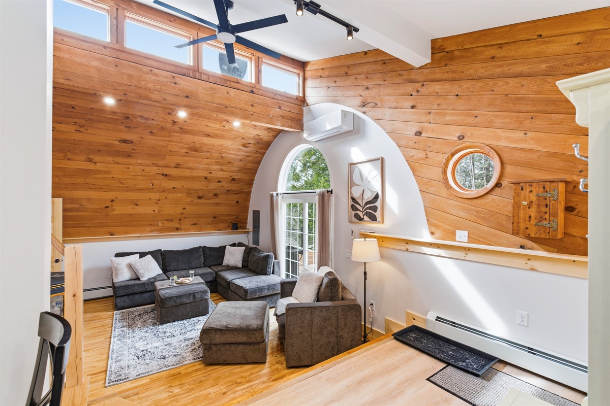 Vaulted ceilings and cozy corners: discover the perfect balance of rustic Maine charm and modern comfort.