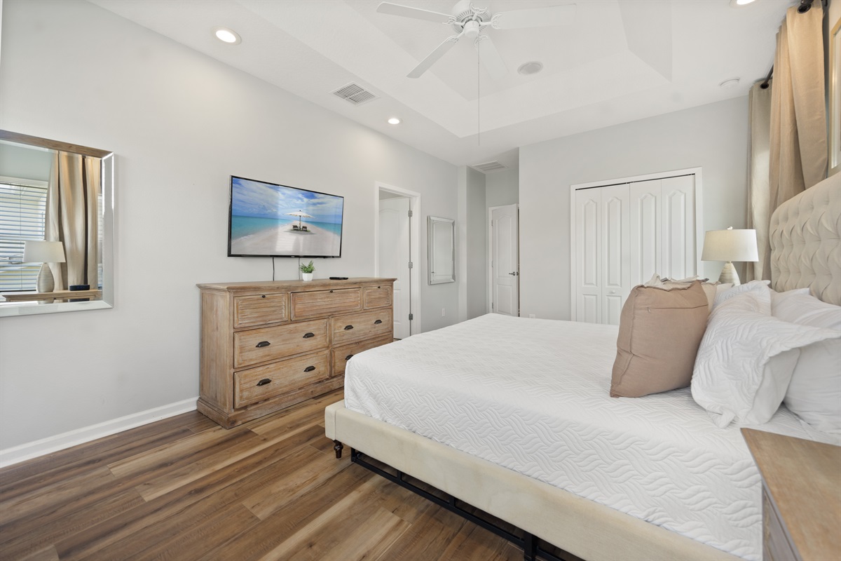 Second floor master bedroom with TV