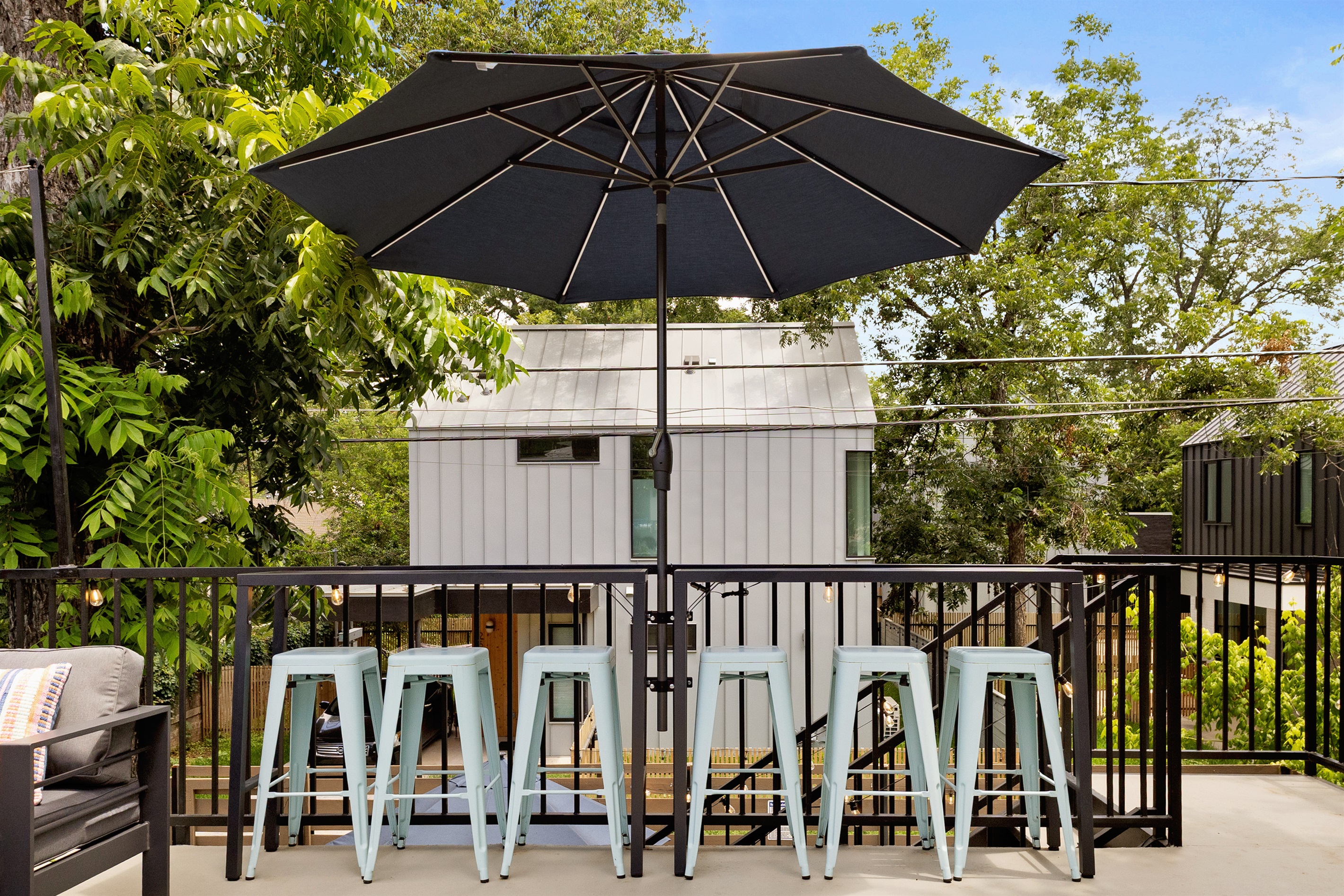 Sip drinks under the shade while soaking in the vibrant Austin atmosphere!