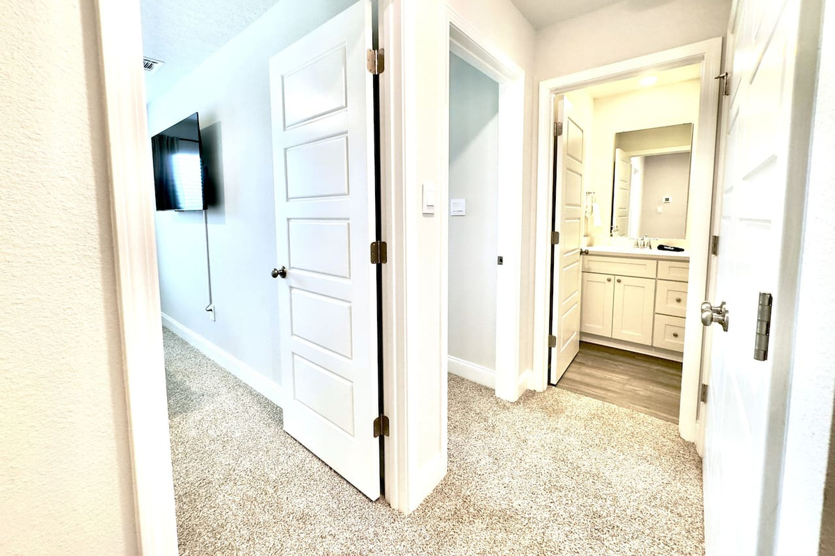 bedroom to one side, bathroom right there to the other. Easy, close together, effortless to move between.