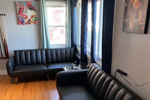 Family Bonding Central!  - Make lasting memories in our living room, equipped with cozy couches