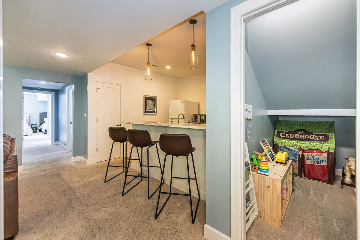Bar area and down the hall is bedroom 4 and bedroom 5.