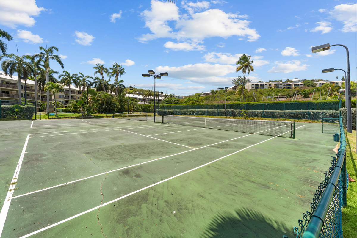 Challenge friends or family to a match on the community tennis courts.