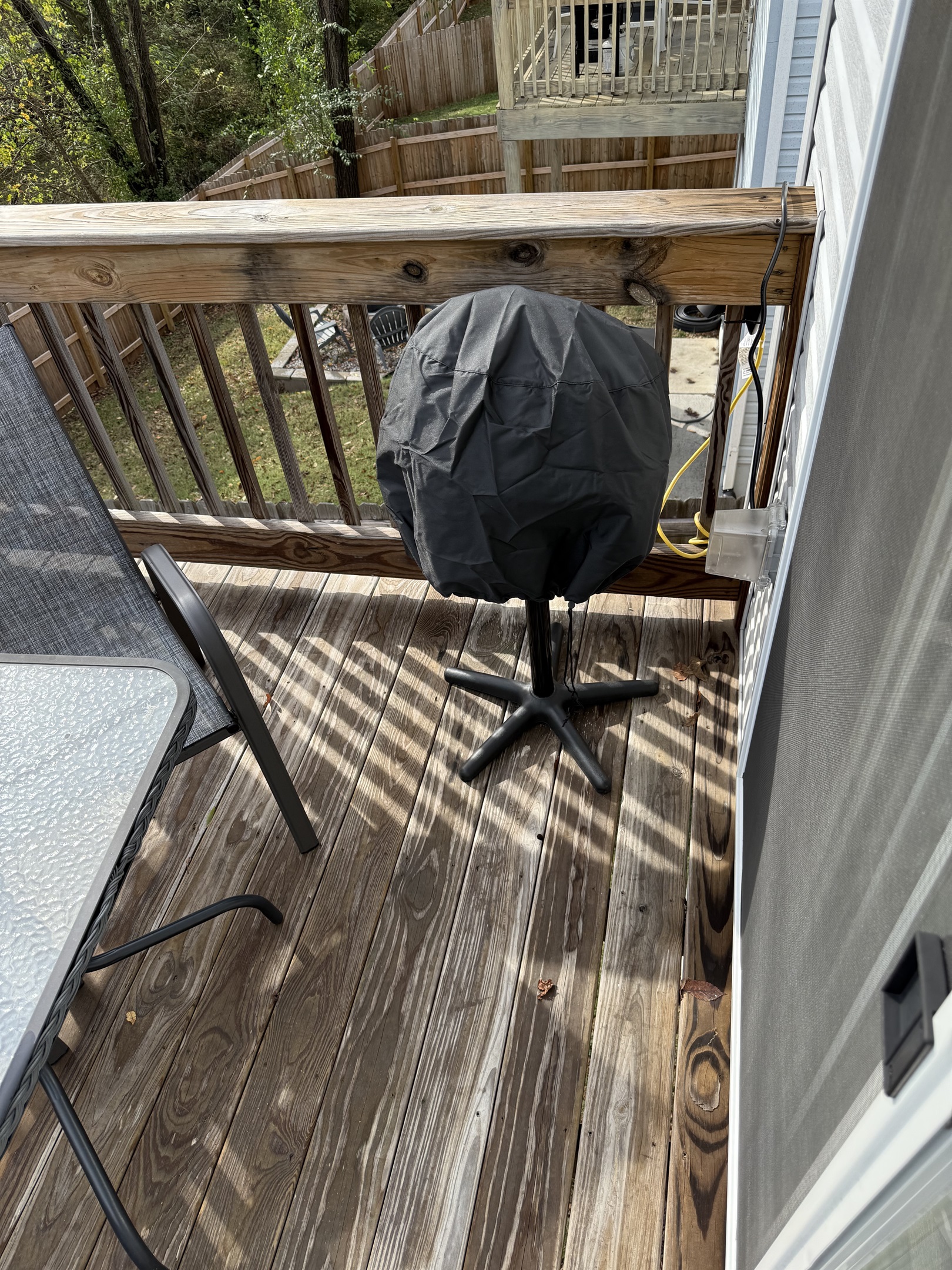Electric outdoor grille on upper deck