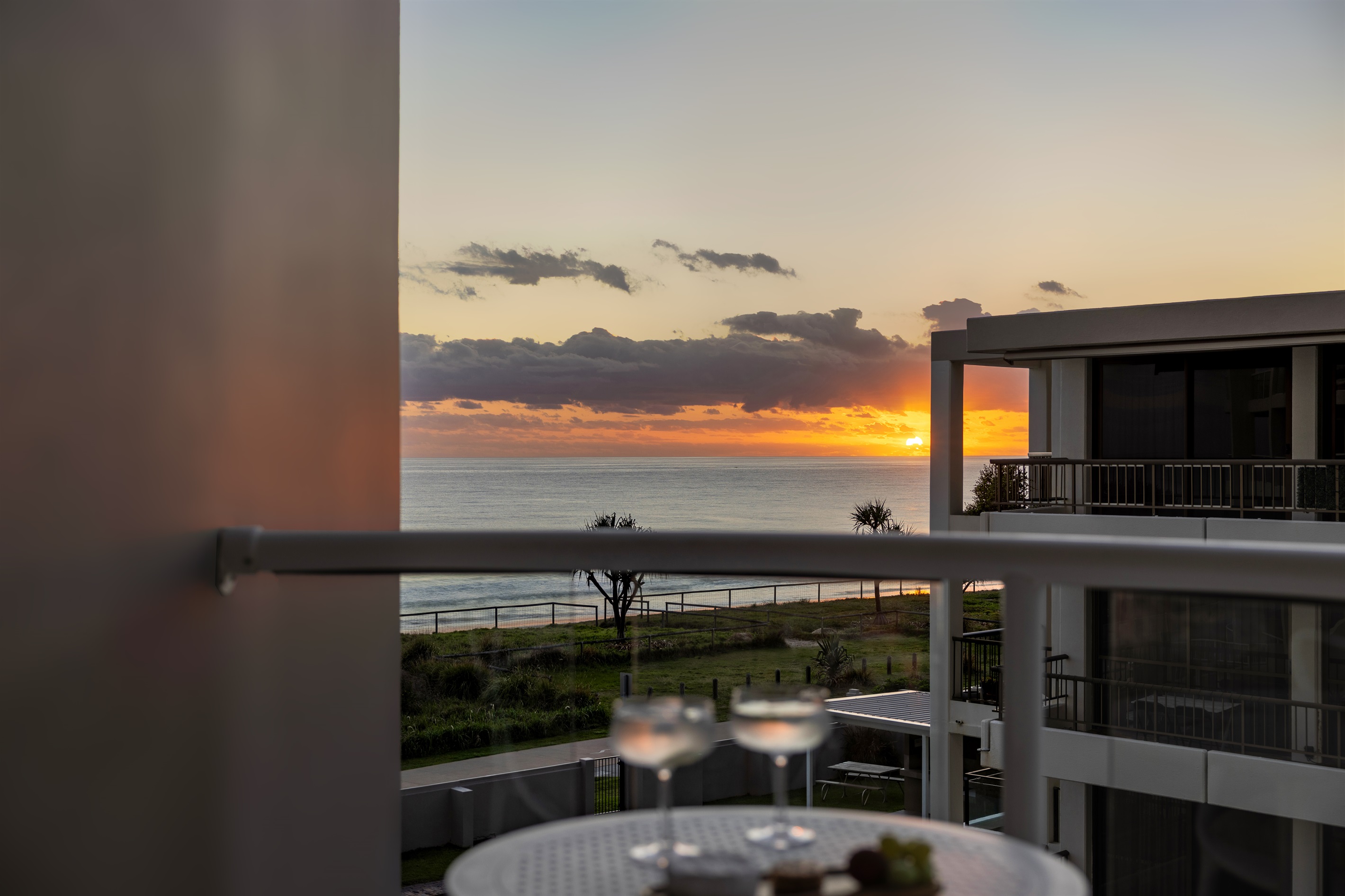 Wake up to stunning ocean sunrises from your private balcony - the perfect way to start the day.