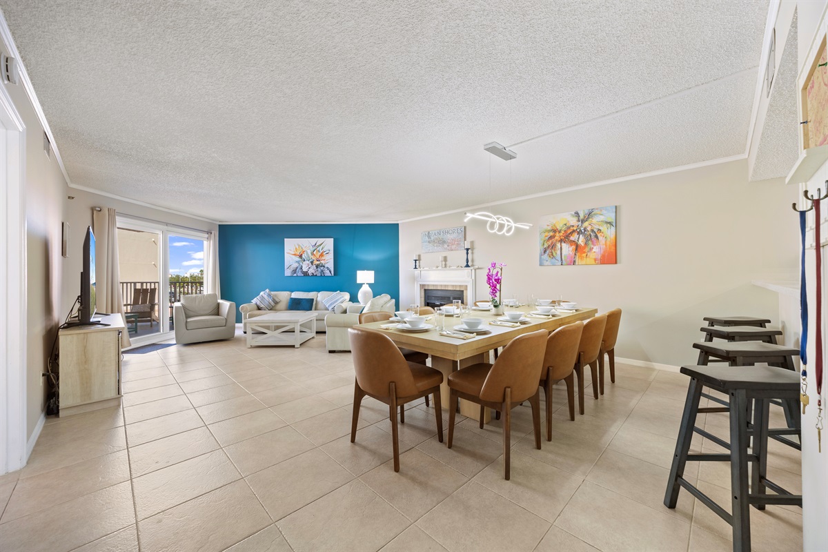 Huge open cozy living room with 70-inch LED Smart TV, Fireplace and Gulf Views