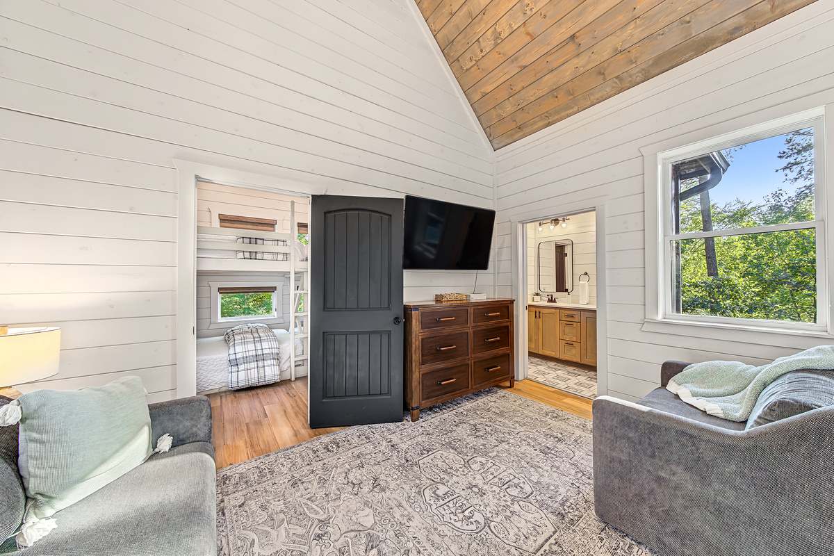 Kids and teens get more than a bunk room. Their pod includes a separate hangout space with TV and Xbox, giving them a place of their own to relax and play.