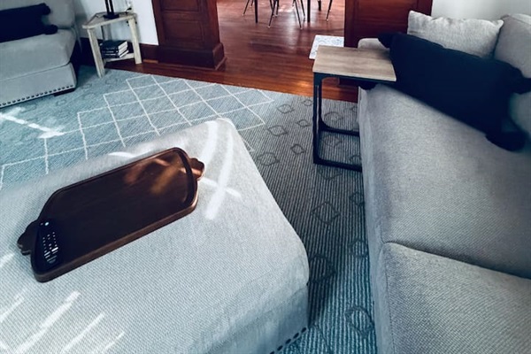 Historic charm with original woodwork connecting the living and dining spaces