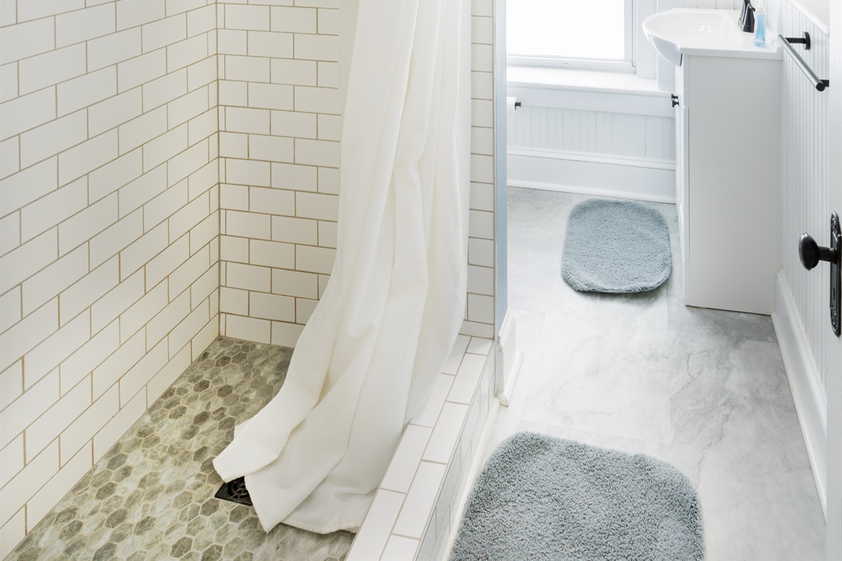 Peaceful and private space with modern fixtures. 2nd floor Full bathroom includes toilet, sink, and shower.