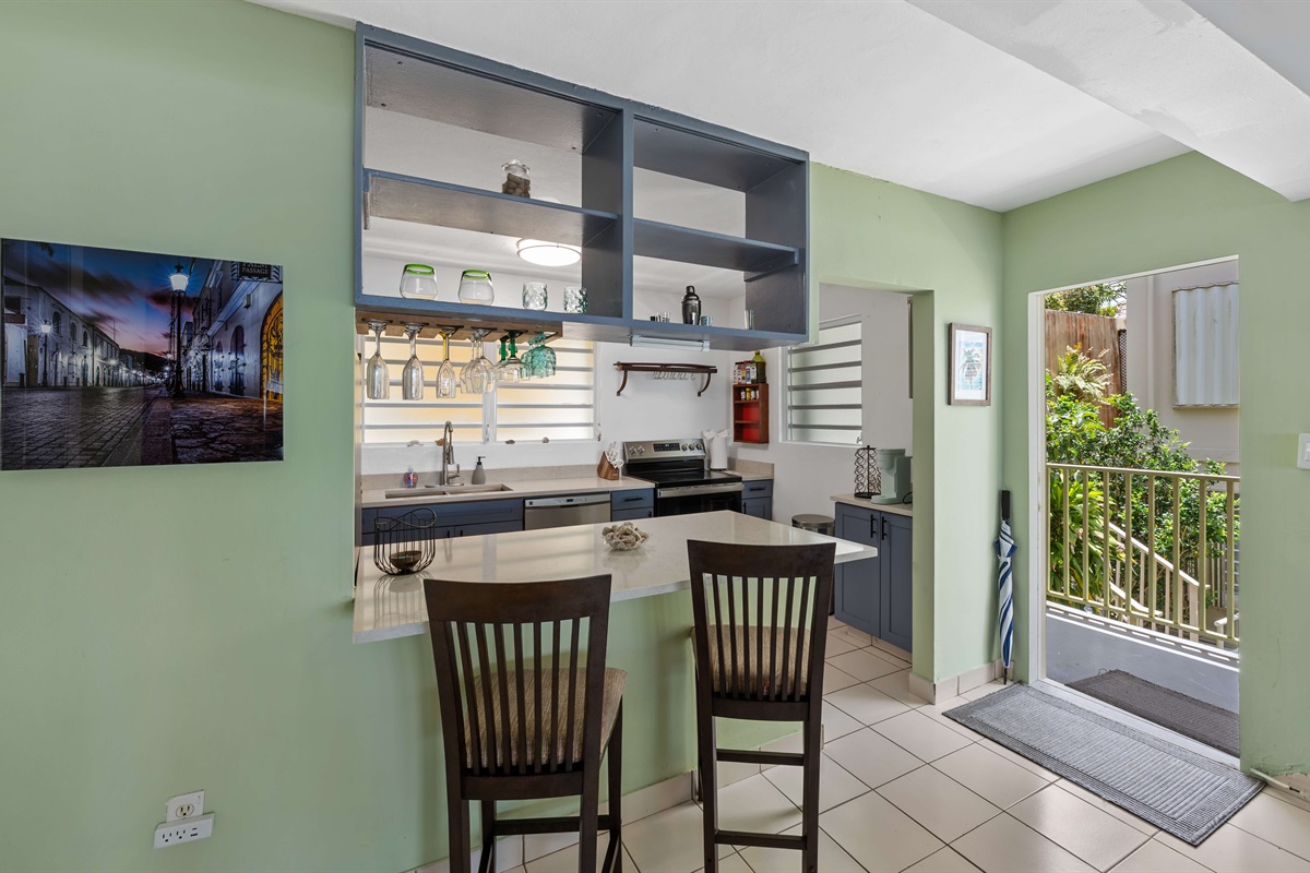 Front door leading right into the kitchen and dining area