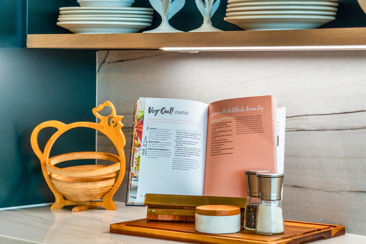 The combination of sleek cabinets and open shelving makes this kitchen nook a practical and beautiful space.