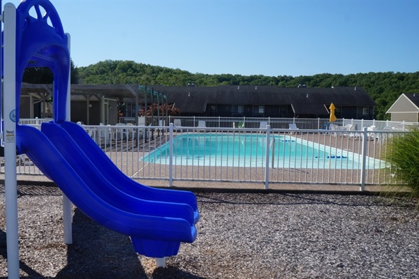 Pool and playground near condo