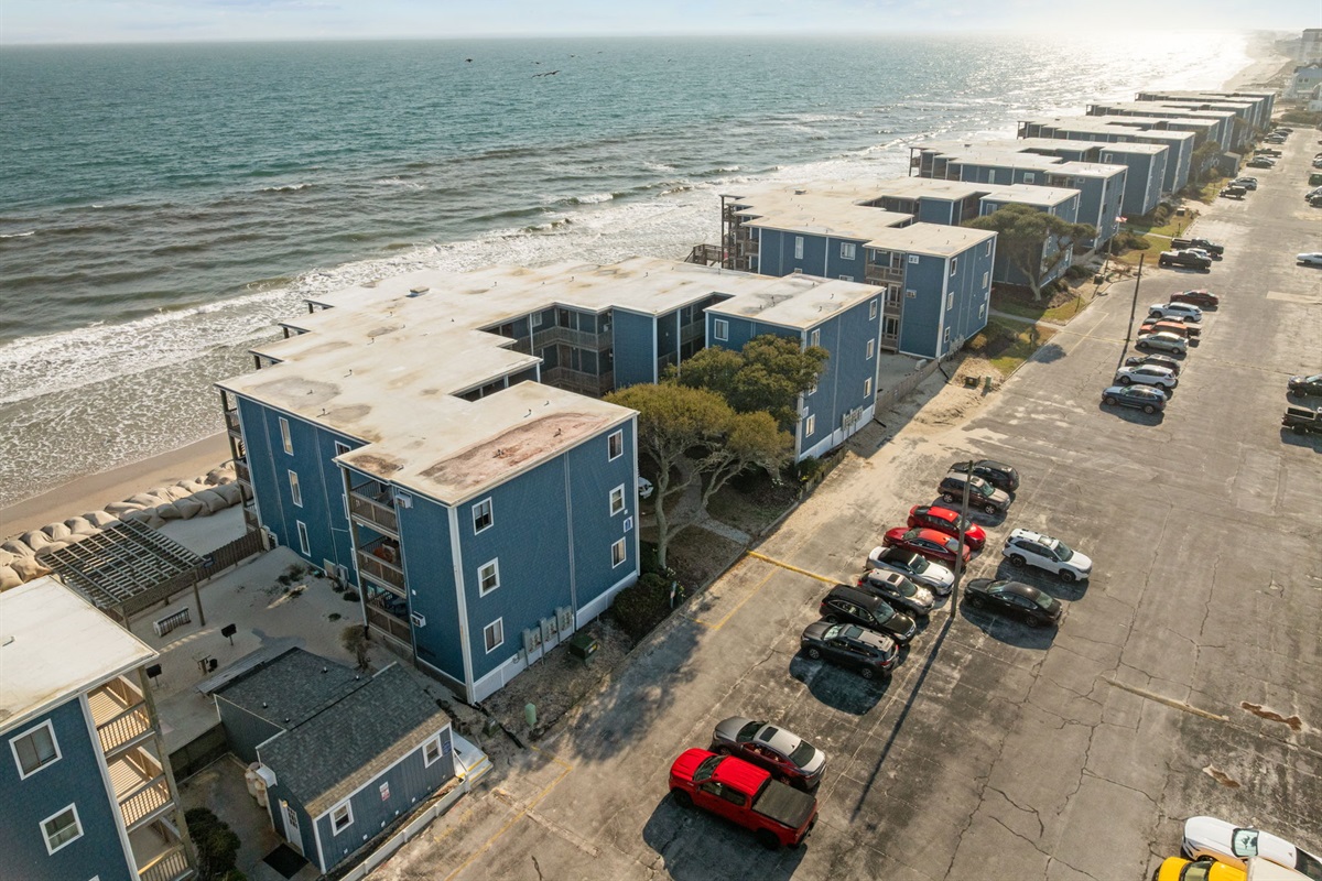 Stunning aerial perspective of the oceanfront condos stretching along the coastline