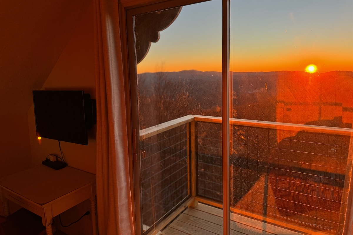 Our Top Floor Queen View Bedroom has a private balcony with sliding door to enjoy the mountain & valley views - the reason you stay in Seven Devils - high above it all! It also has a Desk, Chair, Roku Smart TV, & Twin Futon. Be nice & share that view!