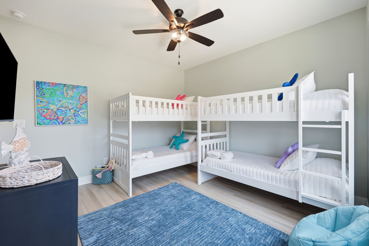 With four twin bunks, this room comfortably sleeps up to four guests
