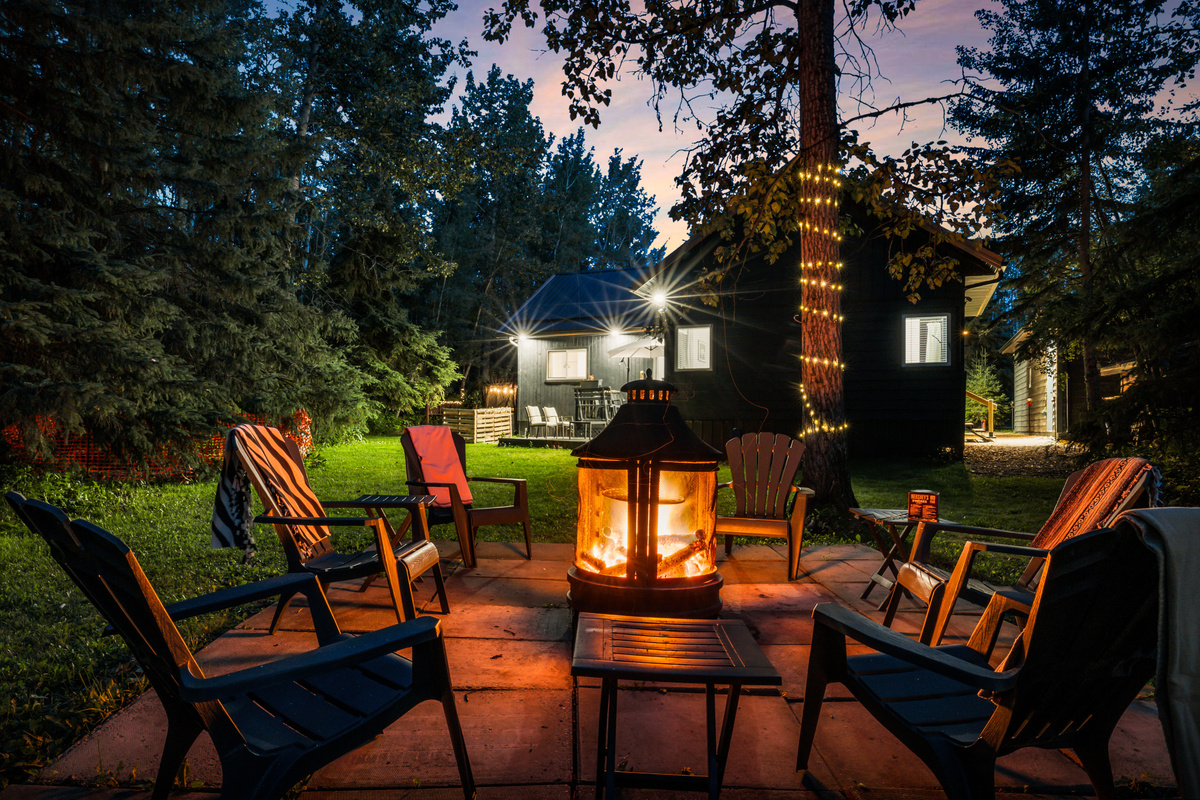Gather around the fire after dark, share stories, and enjoy one of the coziest spots on the property beneath the trees.