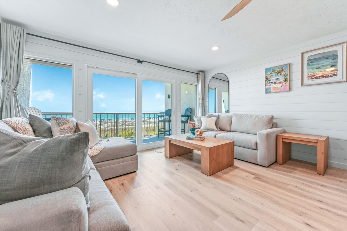 Relaxing living space with large windows showcasing Destin’s emerald waters